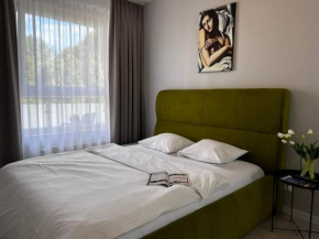 Nr 6 EUROPA22 Apartament Delux z wanną CENTRUM miasta Tomaszów Maz Osiedle BROWARNA przy parku z widokiem na staw Jest winda